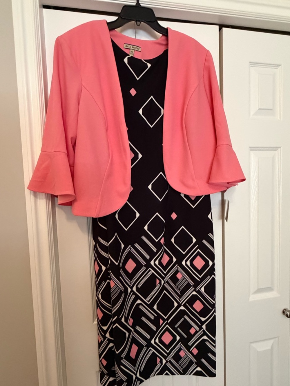 Coral Pink Cropped Jacket with Geometric Black Dress